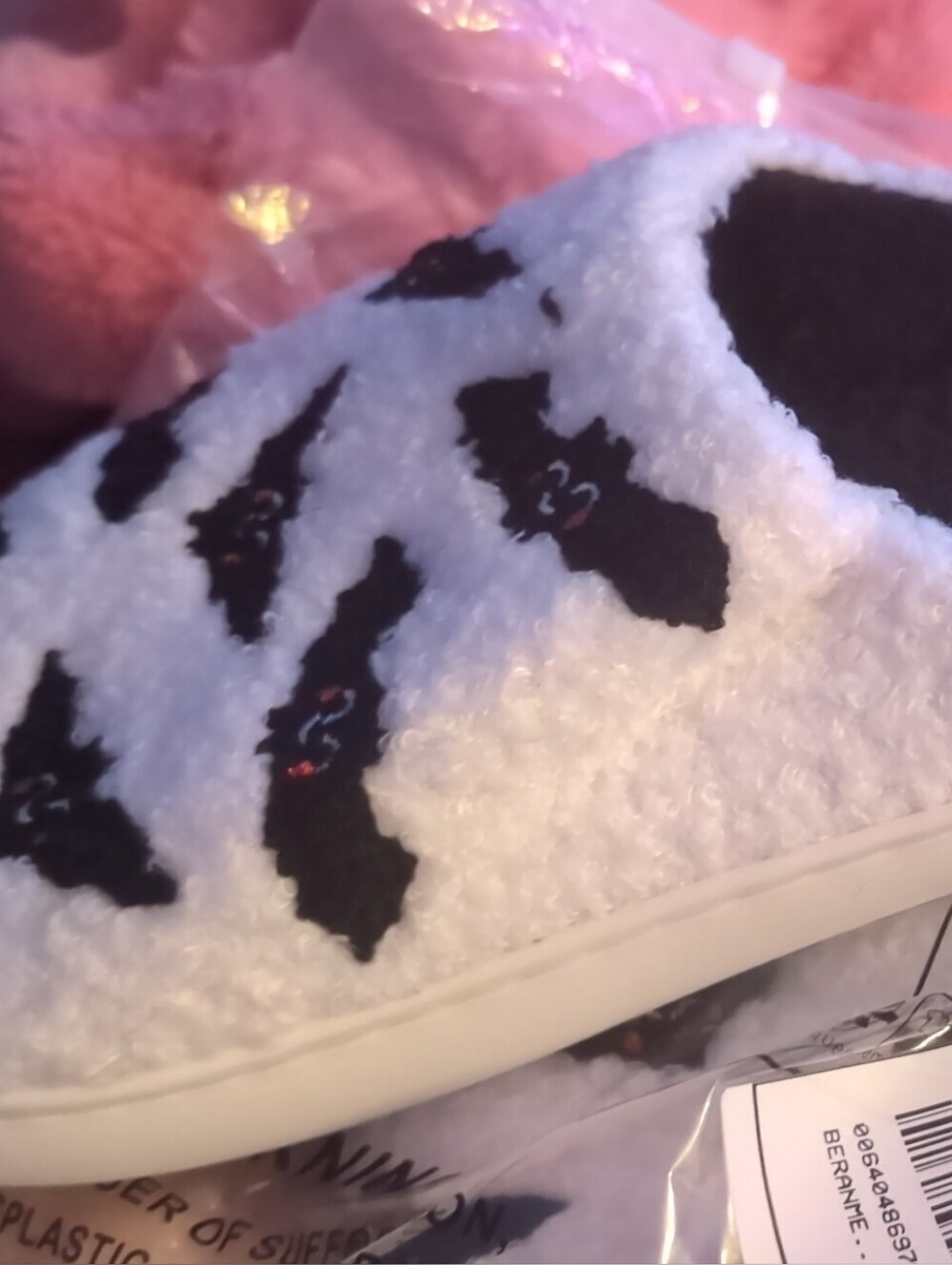 Plush White Slipper with Black Bat Pattern